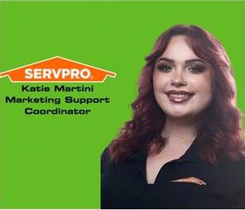 Servpro employee, woman in black polo