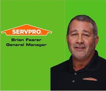 Servpro employee, man in black polo